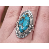 Echt zilveren ring met koper turquoise bewerkte rand.