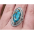 Echt zilveren ring met koper turquoise bewerkte rand.