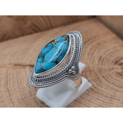 Echt zilveren ring met koper turquoise bewerkte rand.