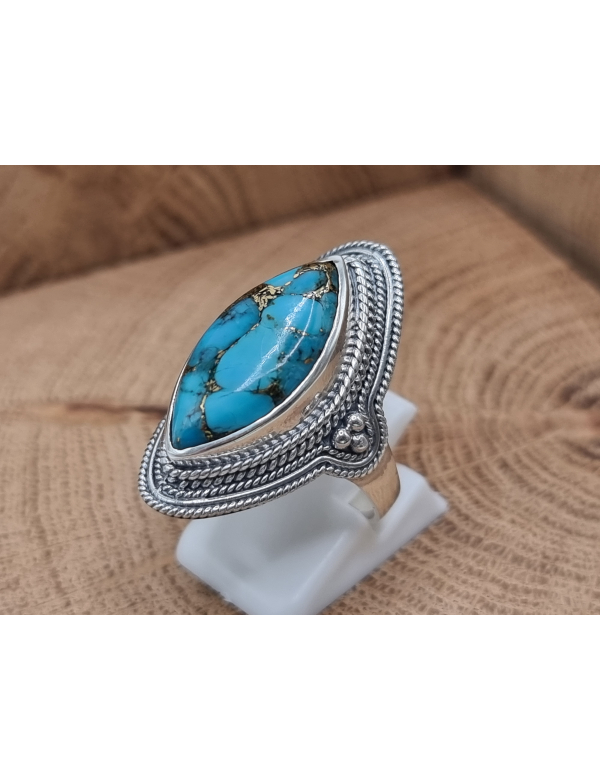 Echt zilveren ring met koper turquoise bewerkte rand.